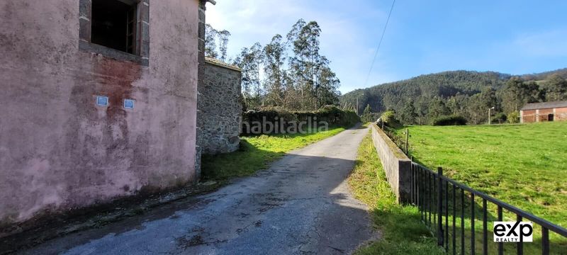 Foto a16a7cb9-99b8-4e51-9bee-afb482f77ae5. Casa adossada amb aparcament a Valadouro (O)
