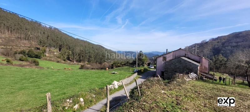 Foto ab8ba83d-a856-4540-8712-a3a9cddefeac. Casa adossada amb aparcament a Valadouro (O)