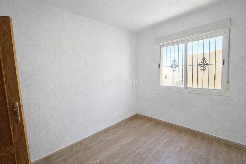 Foto c419cb18-e350-40c8-9f3e-058b82c6ca48. Casa aparellada amb aparcament a San Isidro - Campohermoso Níjar