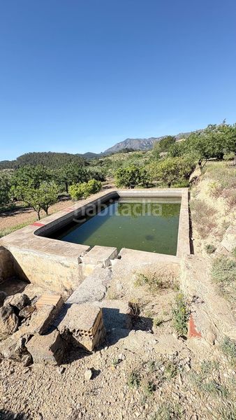 Foto 7aed6c73-99e3-48c2-b4a2-578afe4d32f9. Masia amb aparcament a Relleu