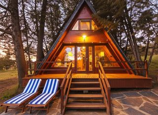 Casa a San Román de los Montes. Casa alpina de madera