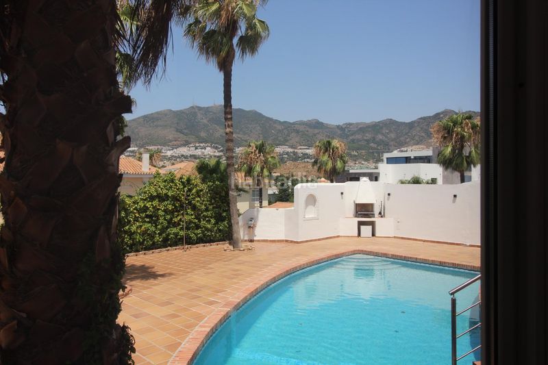 Foto 311e5220-3e58-48a7-ae95-558b564c9279. Chalet mit heizung parking pool in Hacienda Torrequebrada Benalmádena