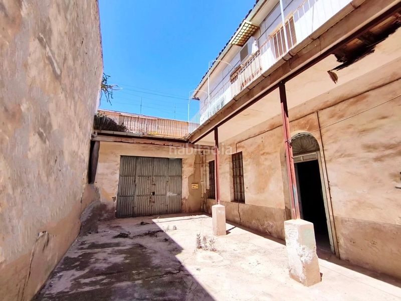 Foto 1e257a25-4b35-4dd2-add9-76e2dec82b34. Casa amb aparcament a Novelda