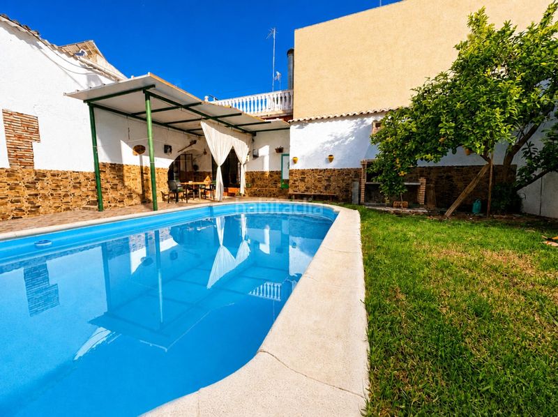 Foto 67826fde-34e6-4233-8899-b2eea0bd7d5a. Casa amb piscina a Arjonilla