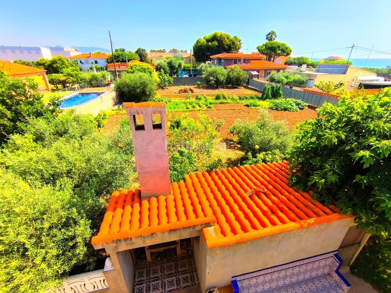 Foto b6c3e7dc-98a9-4c11-a4bf-0bee9c1ad587. Casa amb aparcament a Playa-Ben Afeli Almazora / Almassora