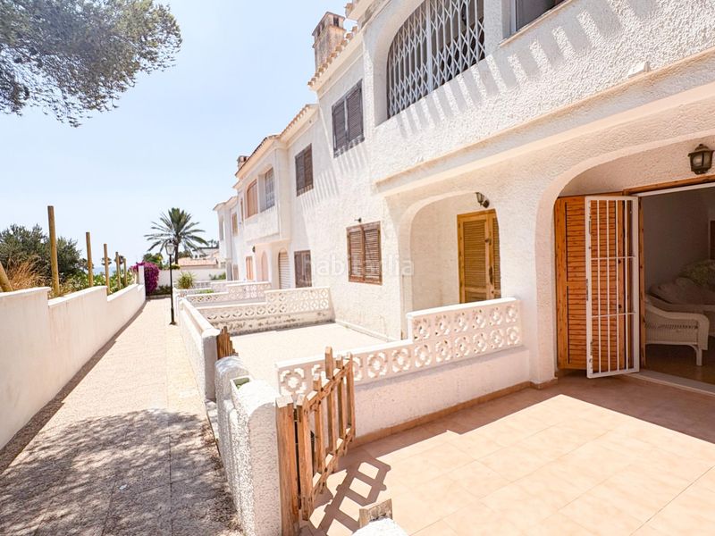 Foto 0d26e96d-d3b5-42aa-9fc3-24cbe72f64bd. Casa adossada amb calefacció aparcament a Playa Flamenca Orihuela