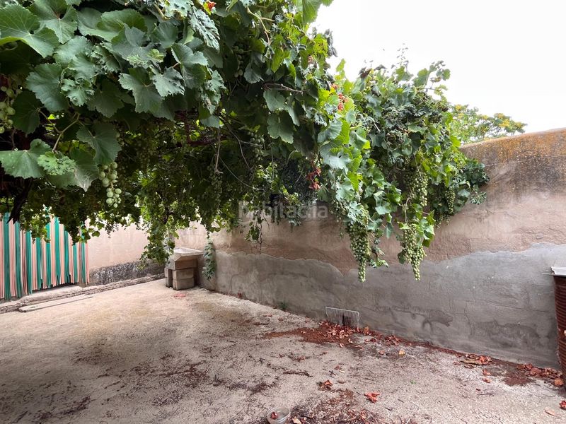 Foto f646cf7d-0d14-470a-a7e0-494bb80b2f9a. Casa adossada amb aparcament a Tobarra