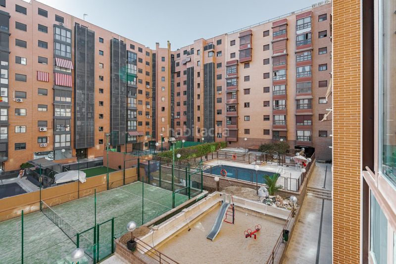 Foto 903d3fab-f43f-41b3-88ee-266dc82961ab. Pis amb calefacció aparcament piscina a Palomeras Sureste Madrid