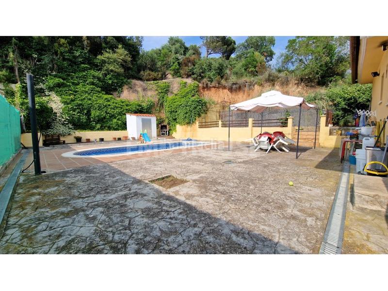 Foto 32958abb-efea-4dfa-a1aa-fa58962abe27. Chalet con parcheggio in Lloret Residencial - Montlloret Lloret de Mar