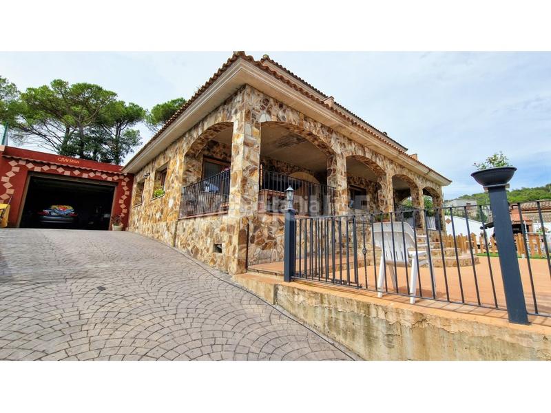 Foto 50858d29-b3d2-4961-9563-f4e7487b2f0f. Chalet preciosa casa estilo rustico en Residencial Park Maçanet de la Selva