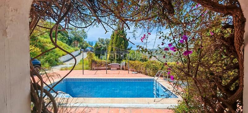 Foto 78d544a5-e828-42b3-a58d-01fd5a03b1a9. Chalet  independiente en venta en Torrox pueblo Torrox