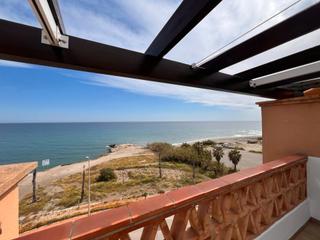 Penthouse en El Peoncillo. tico en primera lnea de playa en torrox costa: vistas al mar