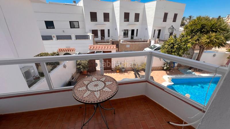 Foto 308147a5-1664-4e30-b1e9-86c310c39770. Casa aparellada amb calefacció aparcament piscina a Torrox