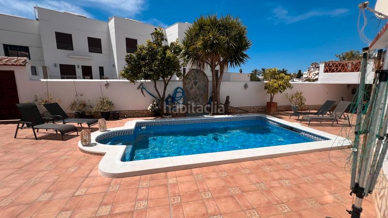 Foto 6545d332-5541-4ddb-b4ad-42d5ae54d14f. Casa aparellada amb calefacció aparcament piscina a Torrox