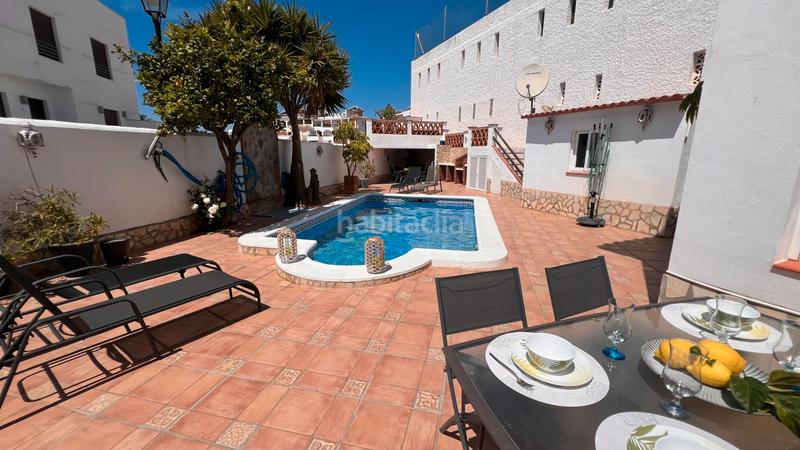 Foto 6a9125c3-ec40-4b81-8ada-25ade599218a. Casa aparellada amb calefacció aparcament piscina a Torrox