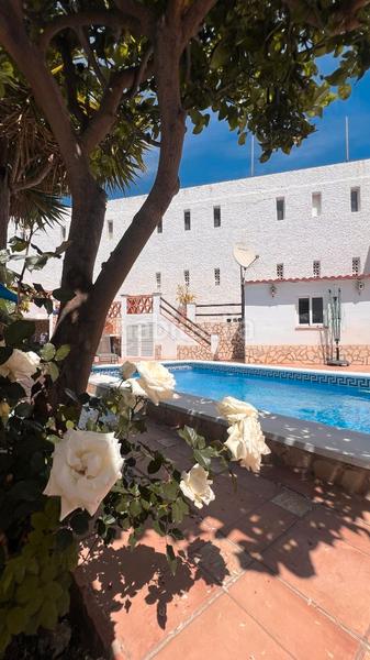 Foto b1791761-a7a8-4dbe-a612-f127760f121a. Casa aparellada amb calefacció aparcament piscina a Torrox