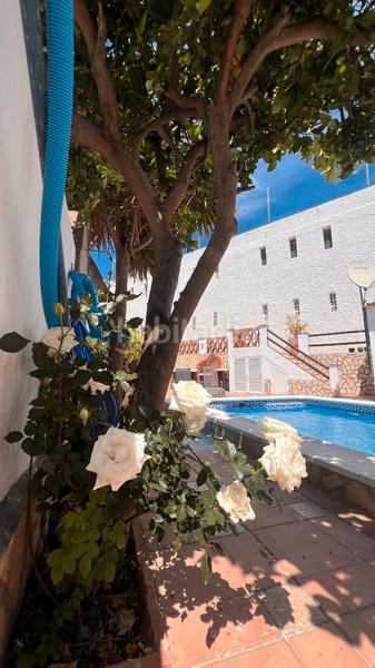 Foto e5210dc0-11a2-4dab-9af0-390f26ad87b0. Casa aparellada amb calefacció aparcament piscina a Torrox