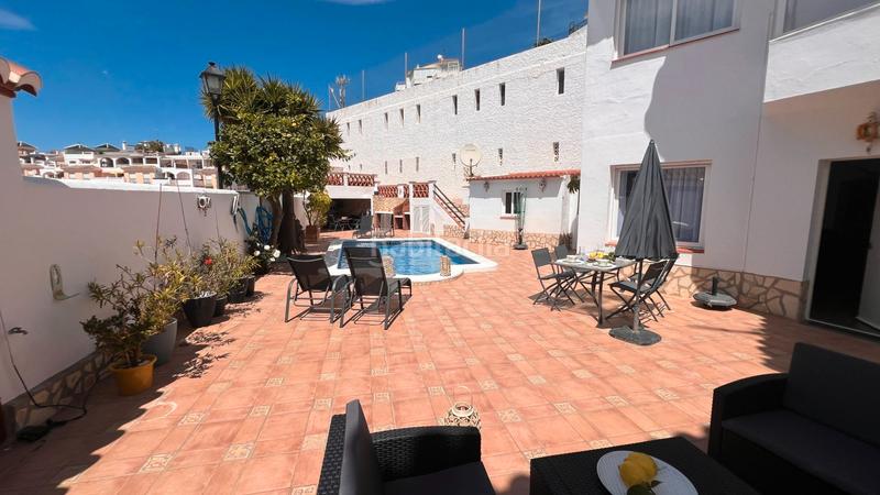 Foto ff49140f-814e-44a6-a8bf-0087bbe4ba48. Casa aparellada amb calefacció aparcament piscina a Torrox