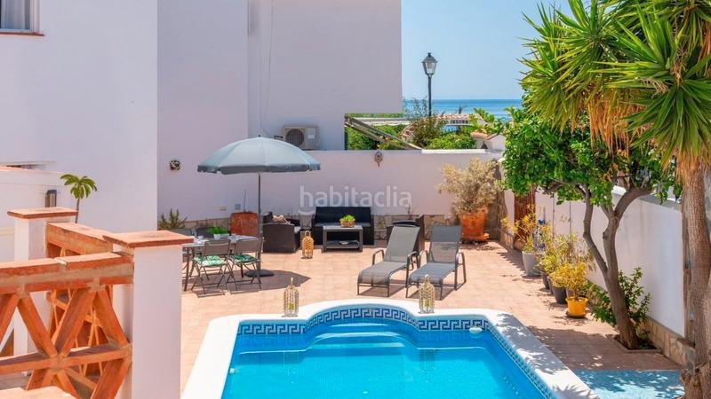 Foto 3bc58b05-f606-413c-a1ee-d4a6116a2360. Doppelhaus mit heizung parking pool in El Peñoncillo Torrox