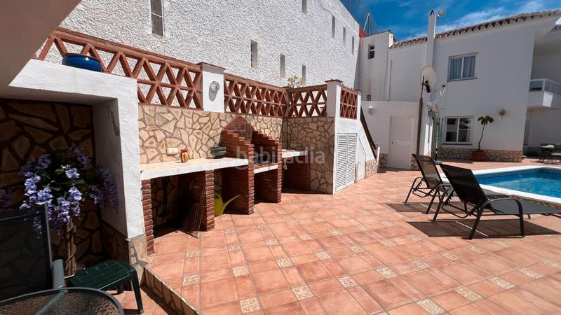 Foto 9c31173f-75ef-49d1-9dfc-b8eb2af15a14. Doppelhaus mit heizung parking pool in El Peñoncillo Torrox