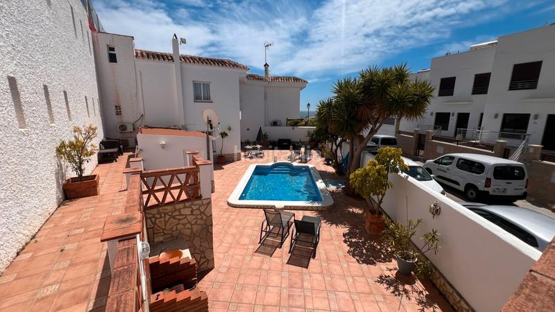 Foto 6f919455-4f49-4eee-bc26-177395b7c3e9. Maison jumelée avec chauffage parking piscine dans El Peñoncillo Torrox