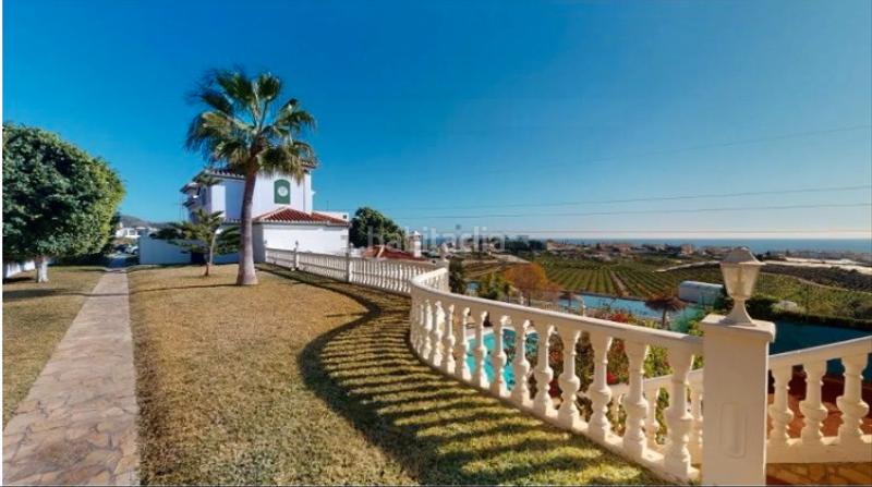 Foto d1a5d0a2-38e2-4a87-a4c6-cad744ada199. Chalet en avenida los aguacates 20 exclusivo chalet costa: un refugio de lujo y tranquilidad con vistas al mar en Torrox