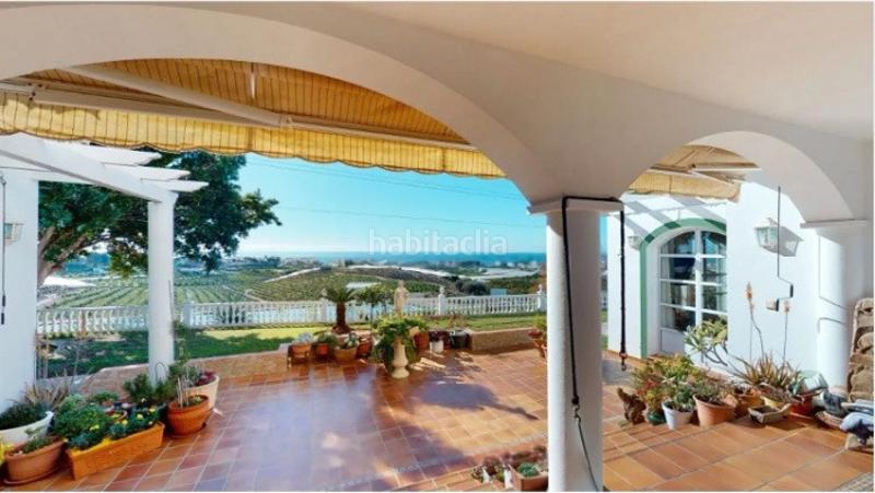 Foto f86cbedb-db0e-4d99-aeb2-1369f5091c92. Chalet en avenida los aguacates 20 exclusivo chalet costa: un refugio de lujo y tranquilidad con vistas al mar en Torrox