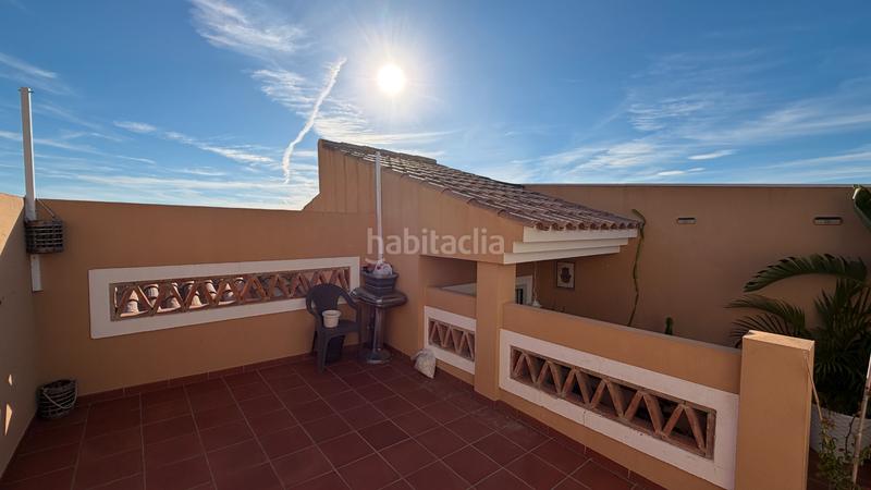 Foto 7a515b4d-f17c-43c1-bce9-107c49759065. Casa aparellada a avenida los poetas 106 a El Peñoncillo Torrox