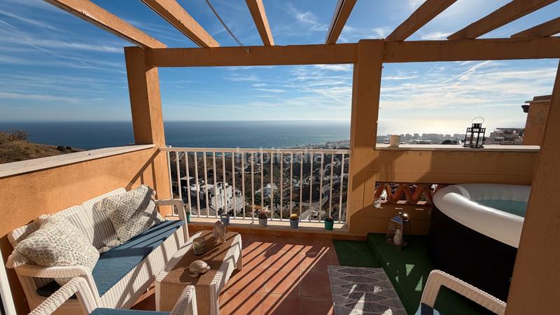 Foto a23be386-bdf6-4968-a04b-3c206dd9794f. Casa aparellada a avenida los poetas 106 a El Peñoncillo Torrox