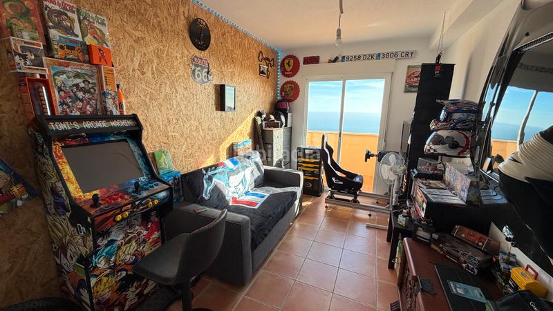 Foto c7d0376a-5544-41ad-bbf3-6512524a0601. Casa aparellada a avenida los poetas 106 a El Peñoncillo Torrox