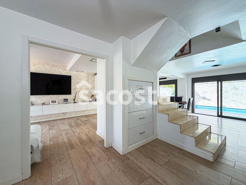 Foto 00d23996-161f-4851-8e0f-820236ffb294. Casa adossada amb calefacció aparcament piscina a Canet de Mar