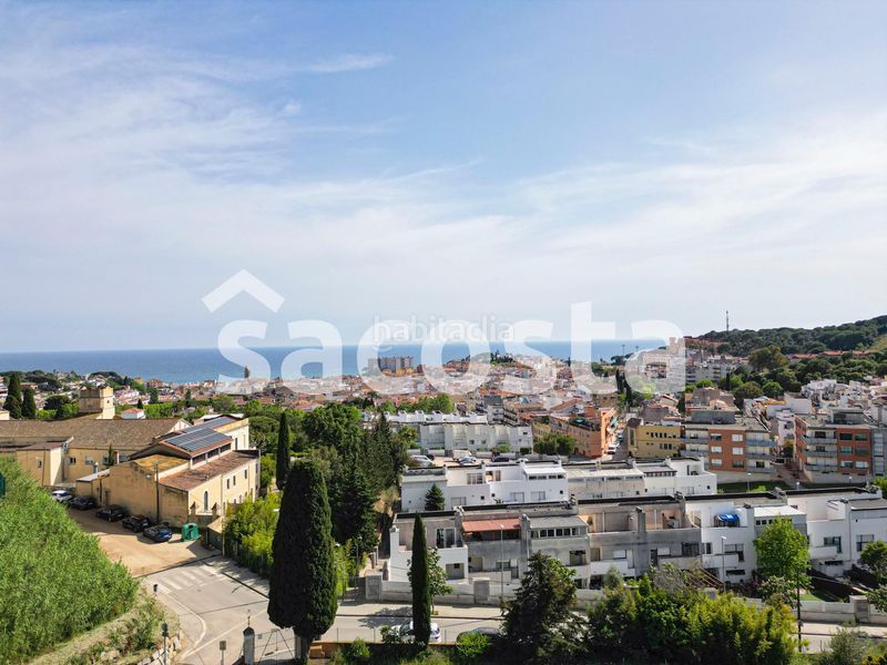 Foto 01dea0f3-d7fd-43df-bb87-a079f0e872dd. Casa adossada amb calefacció aparcament piscina a Canet de Mar