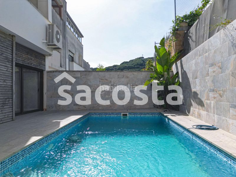 Foto f9d2ddca-e210-498b-b607-be528c96e831. Casa adossada amb calefacció aparcament piscina a Canet de Mar
