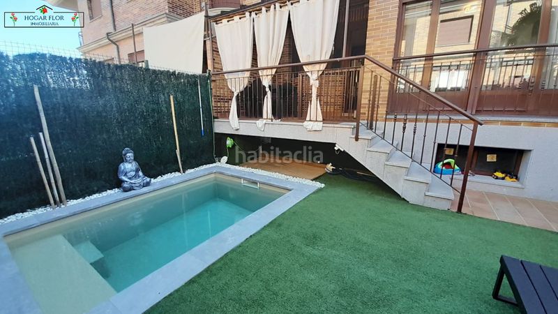 Foto 307ce7a4-03dc-4722-af0e-9e8b0dc00ff7. Casa a schiera con riscaldamento parcheggio piscina in Villares de la Reina