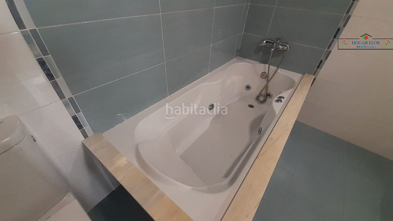 Foto 51945e5e-52c2-4ed5-a024-07fc35827069. Casa a schiera con riscaldamento parcheggio piscina in Villares de la Reina