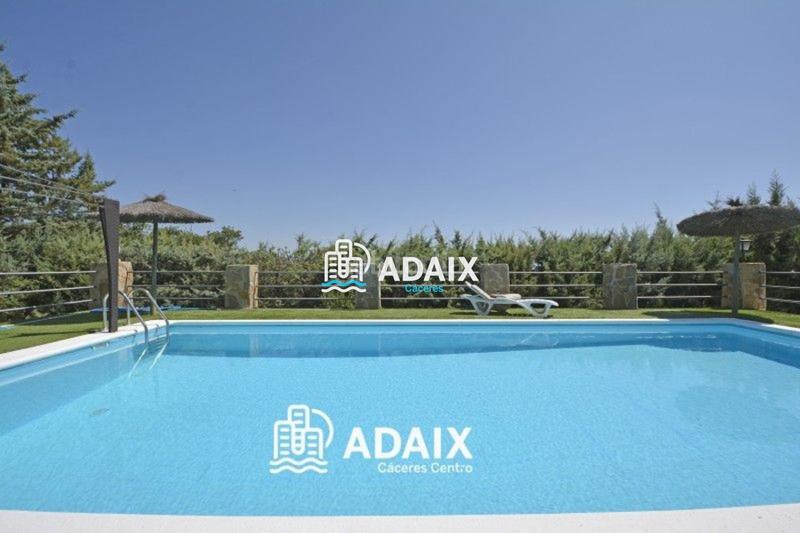 Foto f2a34f8d-9d03-471f-8417-21033fe4683c. Maison avec piscine dans Campus Universitario Cáceres