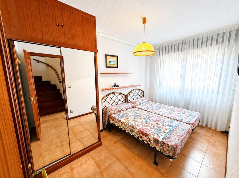 Foto 005452cc-3382-4d21-955c-6415541ac834. Casa adossada amb calefacció piscina a El Puntal Laredo
