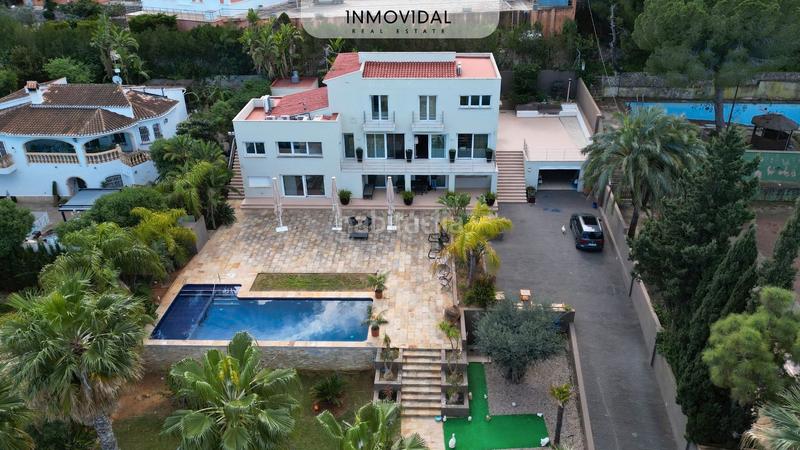 Foto 83a8a365-044a-47fe-a389-7f8ba37214cd. Chalet avec cheminée chauffage parking piscine dans Dénia