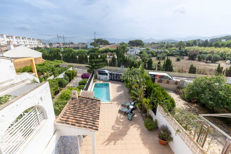 Foto 407a6e62-1851-469e-aaaf-73fe3a1fbd64. Chalet dans carrer de roderic de osona 166 dans Oliva nova Oliva