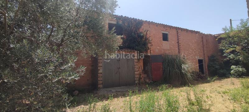 Foto 98133211-d481-4105-85fe-395b3c2b3e58. Chalet en n/a en venda xalet de pedra a reformar de 742 m2 de superfície construïda, sobre un terreny rústic de regadiu de 19.080 m2 al municipi en Borges Blanques (Les)