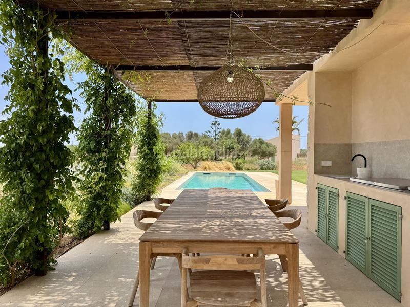 Foto b19d690b-0501-4ade-ad68-eab47ba80376. Casale in sa rapita 150 in Campos