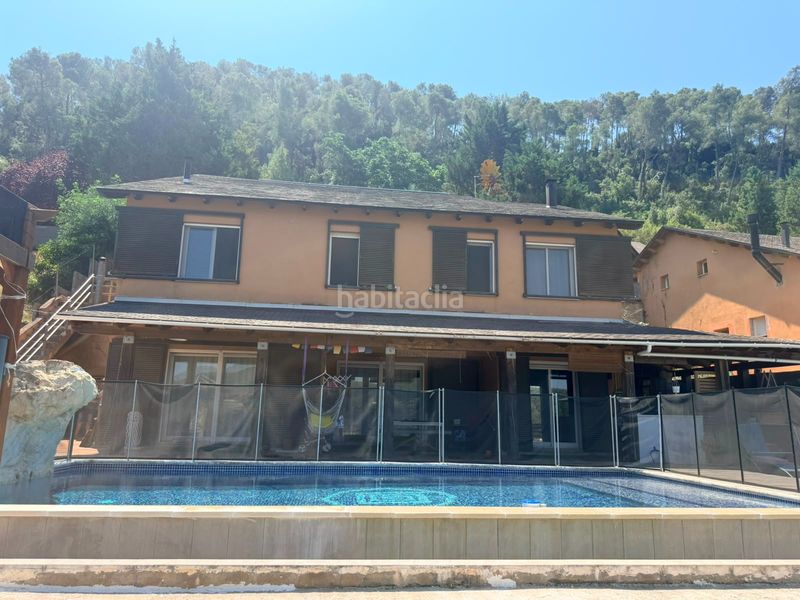 Foto dda35bce-c3d2-4fea-942e-9aeefd8fa516. Casa amb xemeneia calefacció aparcament piscina a Vallirana