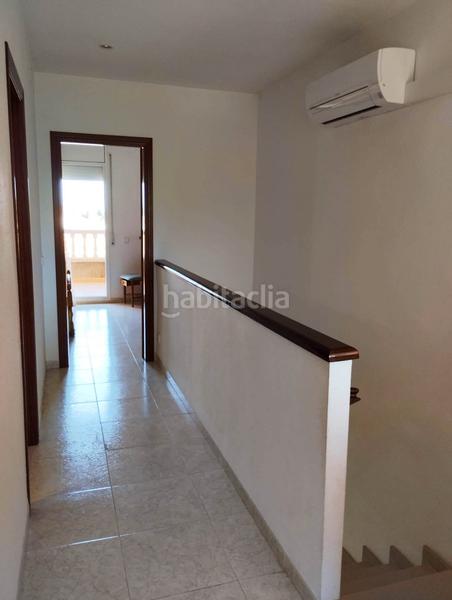 Foto 4298f164-a5ba-48ea-b0ea-7fe00b329f2f. Casa adossada amb xemeneia aparcament piscina a El Casalot Mont-roig del Camp