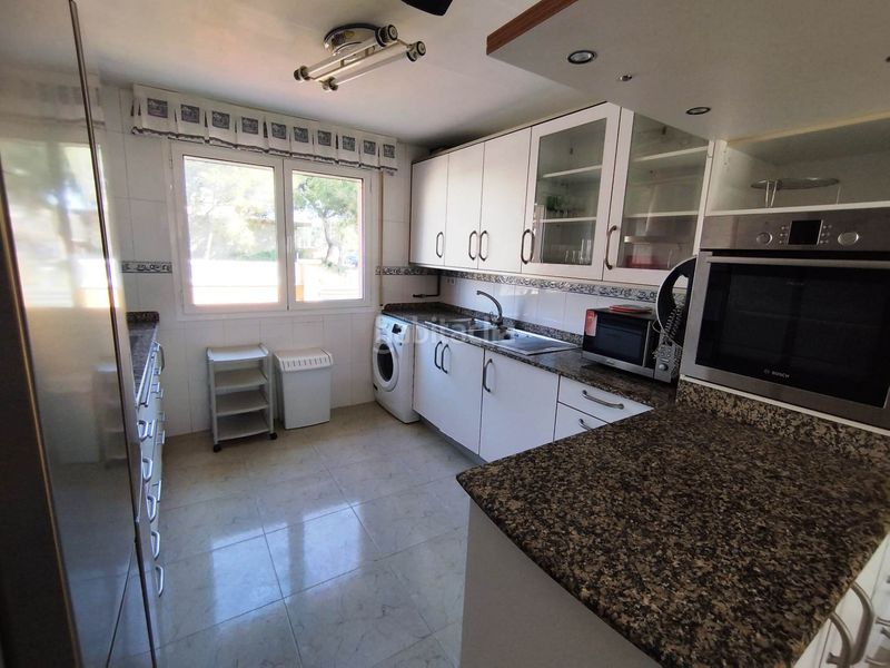 Foto dceb21bc-75ea-42e4-8bb8-027295cb4162. Casa adossada amb piscina a Passeig Marítim Miami Platja