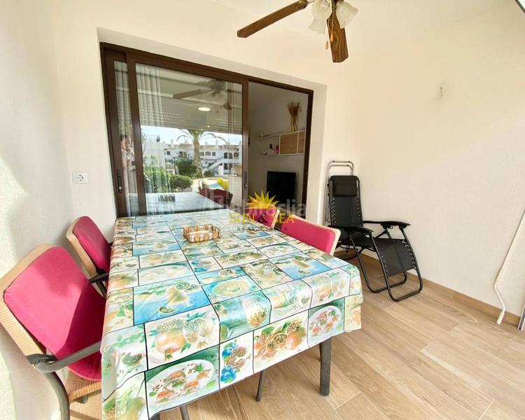 Foto 15f6013e-d275-4e40-8021-2da99af6ec68. Alquiler chalet iexclalquiler desde ya hasta junio!iexclbienvenido a tu nuevo hogar en Cabo Roig! este encantador chalet adosado en alquiler es pe en Orihuela