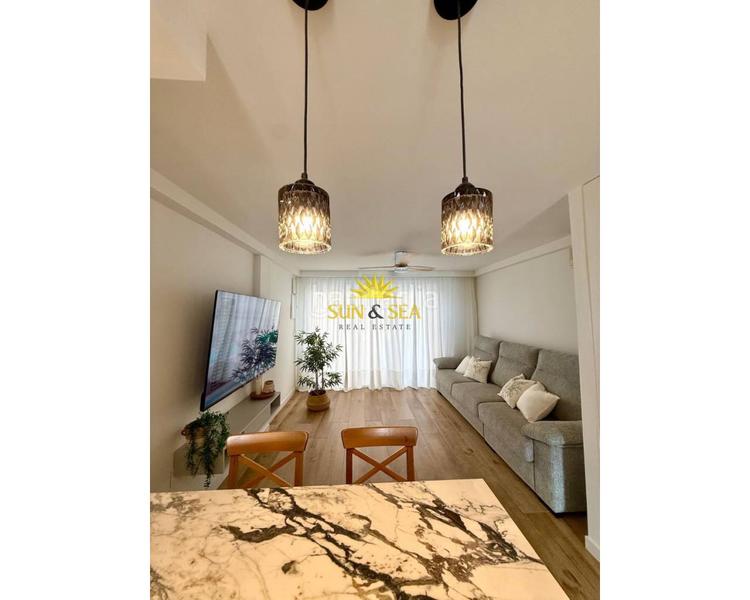 Foto 78811e60-8cda-495a-accd-6485c448df96. Rent flat with heating parking pool in Campoamor Orihuela