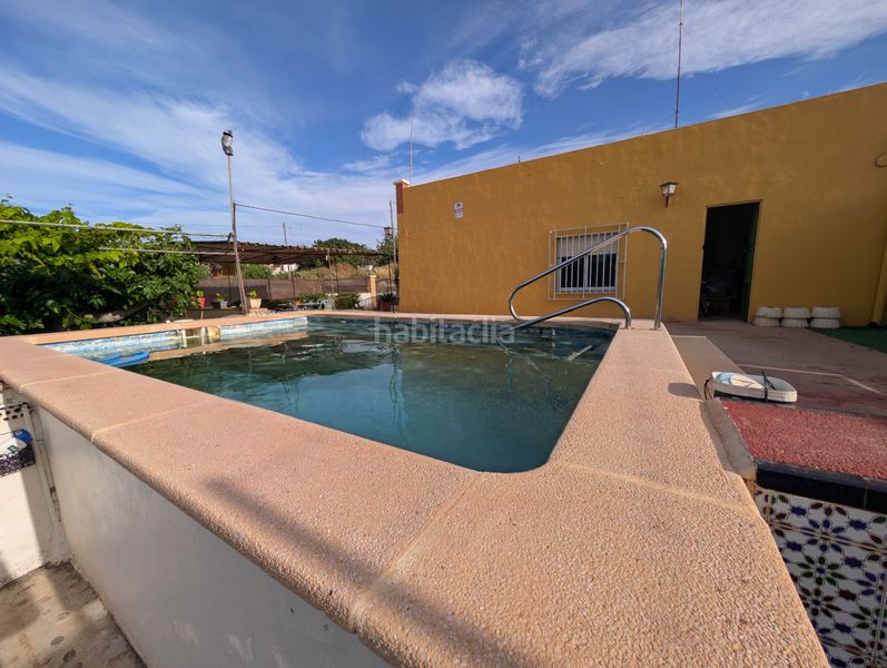 Foto 0db2fae1-1aa0-4f89-8a89-0069d4e69e93. Masia amb xemeneia piscina a Perín Cartagena