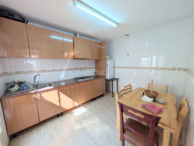 Foto b1b1a0c3-84a7-4dc1-a74e-3a2e2490c195. Casa aparellada amb aparcament a La Palma Cartagena