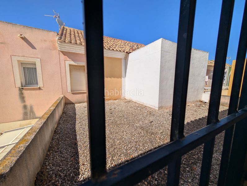 Foto bcdbdf28-4696-478d-b76a-6bb24eba2d2d. Casa aparellada amb aparcament a La Palma Cartagena