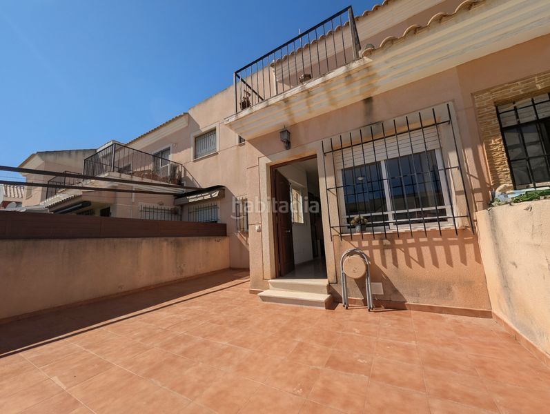 Foto ca08423e-2a07-4e9d-992d-67581d60444a. Casa aparellada amb aparcament a La Palma Cartagena